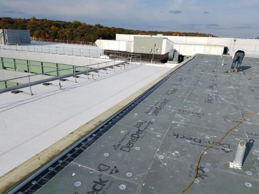Flat roof repair and emergency services by All-Star Roofing Inc. in West Islip and Amity Harbor NY